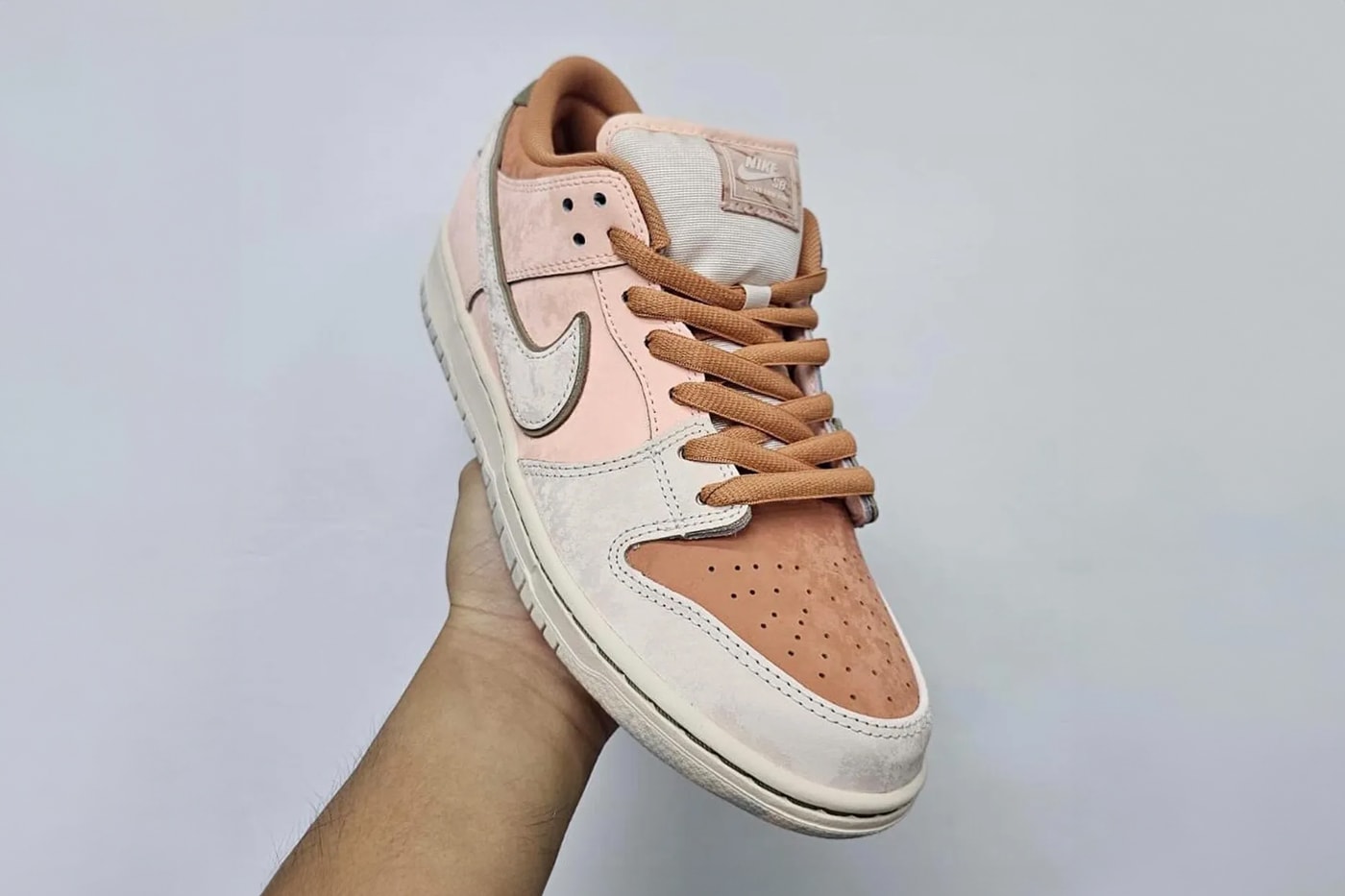 First Look at the Nike SB Dunk Low "Trocadéro Gardens" Amber Brown/Guava Ice-Crimson Tint-Hemp-Neutral Olive-Pale Ivory FV5926-200 release info paris olympics
