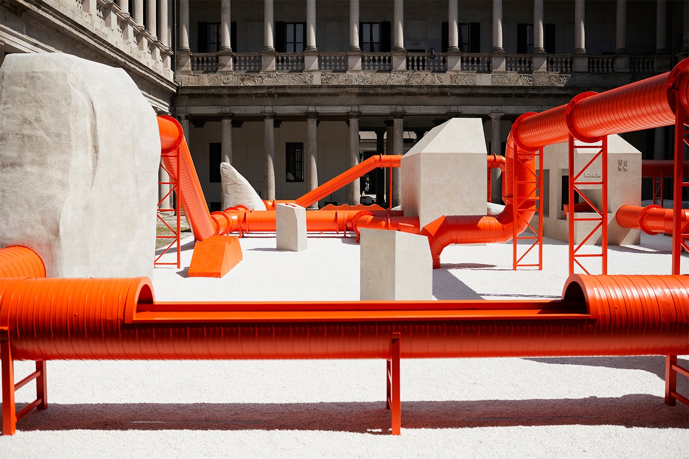 Samuel Ross Creates a Brutalist-Inspired Maze of Orange Pipes Inside an Italian Palazzo 