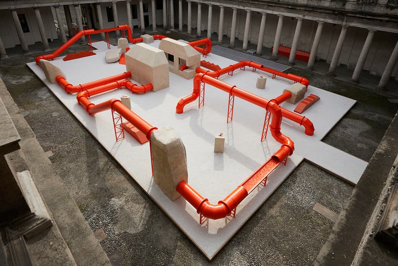 Samuel Ross Creates a Brutalist-Inspired Maze of Orange Pipes Inside an Italian Palazzo 