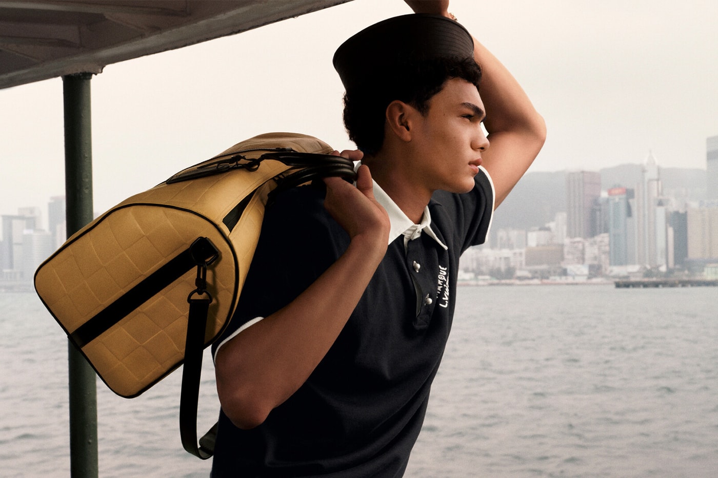 Louis Vuitton and Pharrell Williams Embraces Hong Kong for Men's Pre-Fall 2024 Drop 1 Collection Campaign sailor skyline nautical theme 