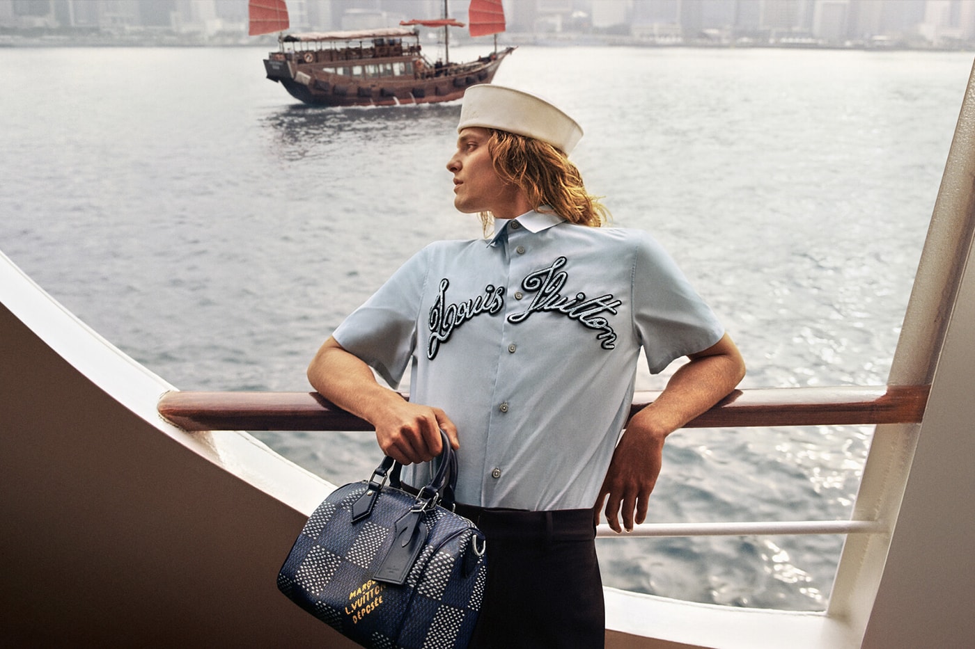 Louis Vuitton and Pharrell Williams Embraces Hong Kong for Men's Pre-Fall 2024 Drop 1 Collection Campaign sailor skyline nautical theme 