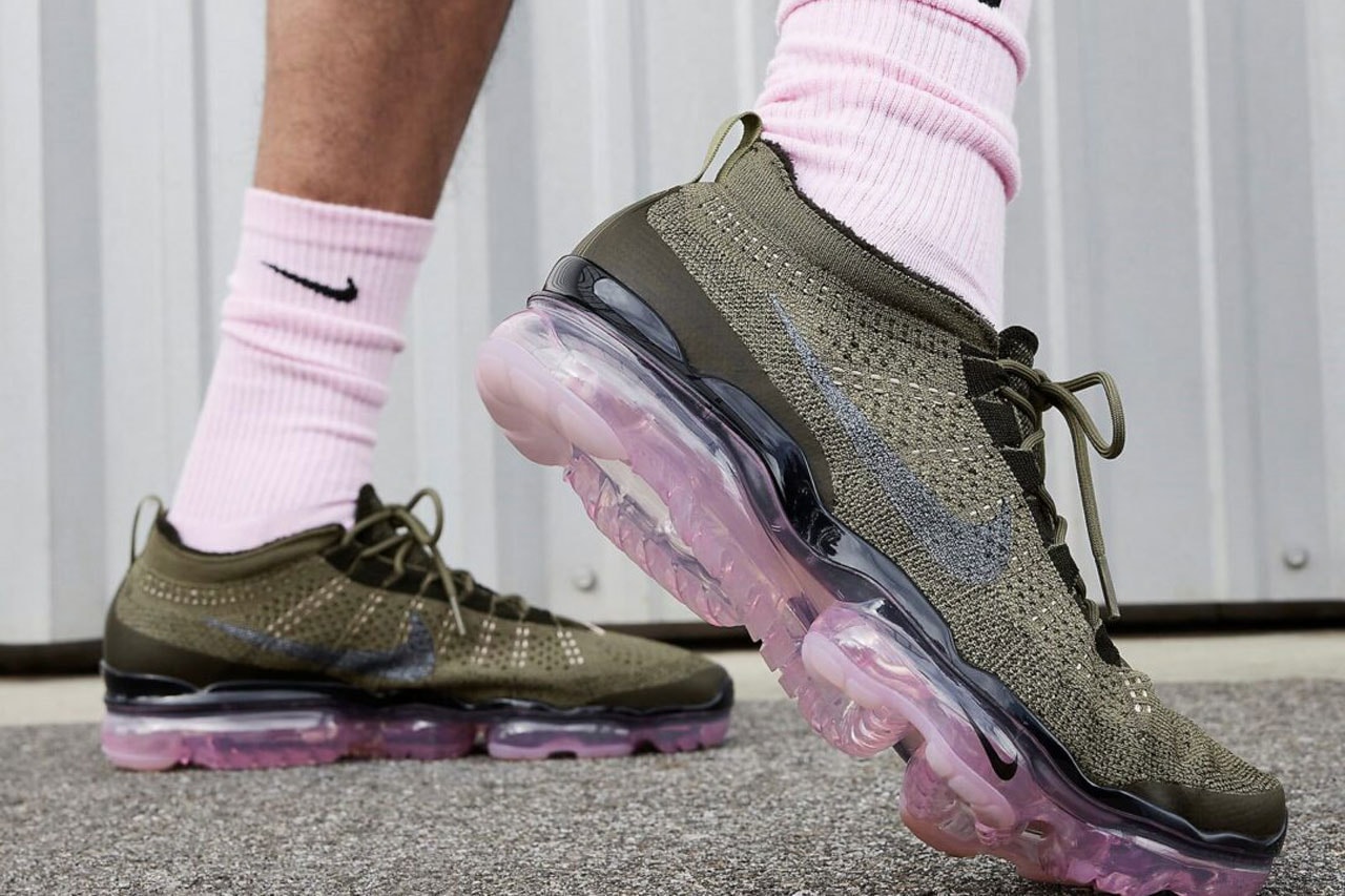Nike Air Vapormax 2023 Flyknit Arrives in "Medium Olive/Pink Oxford" sneakers footwear drop price sole midsole air max vapor pink pastel green link upper laces swoosh logo midsole 