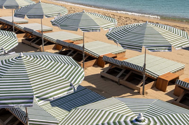 Jacquemus Is Ready for a Saint-Tropez Summer With New Pop-up and Beach Club south of france summer stripes cafe la renaissance place des lices french designer simon porte jacquemus mediterranean