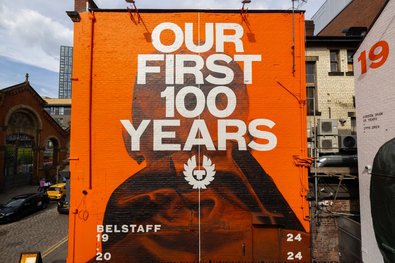 belstaff manchester anniversary 100 years activation campaign murals posters exhibition centenary jacket bus stop billboard advertising