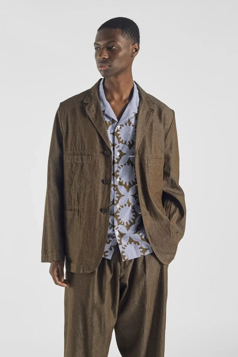 Universal Works Opens Its "Hotel Deluxe" Lookbook for the Summer capsule collection uk london across the pond nottingham link collection capsule drop release price print pattern hoodie oxford shirt button fabric suit jacket shorts pants apparel fashion staycation vacation bahamas Bridlington