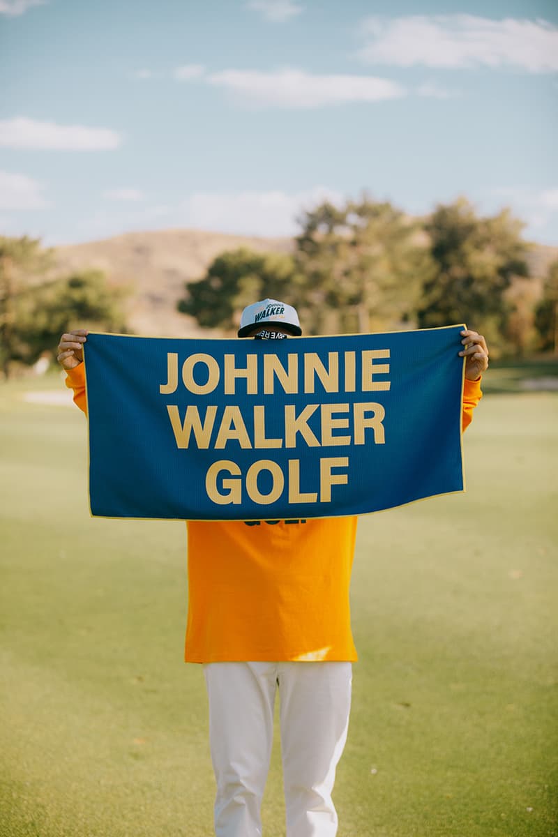 devereux golf johnnie walker collection collaboration tee shirt towel hat blue yellow logo graphic whisky