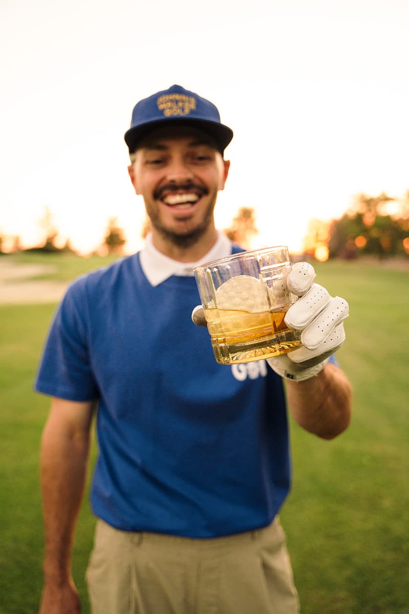 devereux golf johnnie walker collection collaboration tee shirt towel hat blue yellow logo graphic whisky