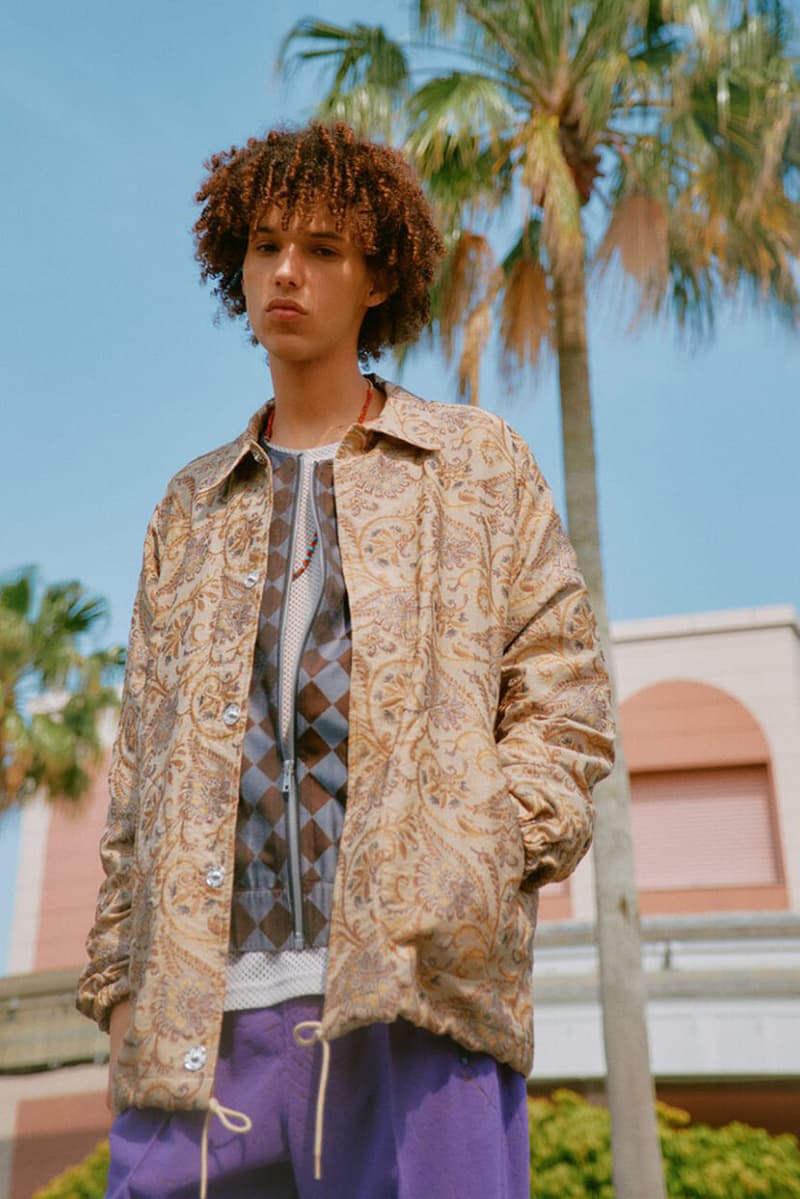 NEEDLES Reveals Striking Spring/Summer 2025 Collection paris release tracksuit fashion week jacket blazer pattern print button pants trouser skirt track suit sweat suit shorts shirt long short sleeve price drop lookbook nepenthes offering presentation capsule japan tokyo new york city nyc drop cop