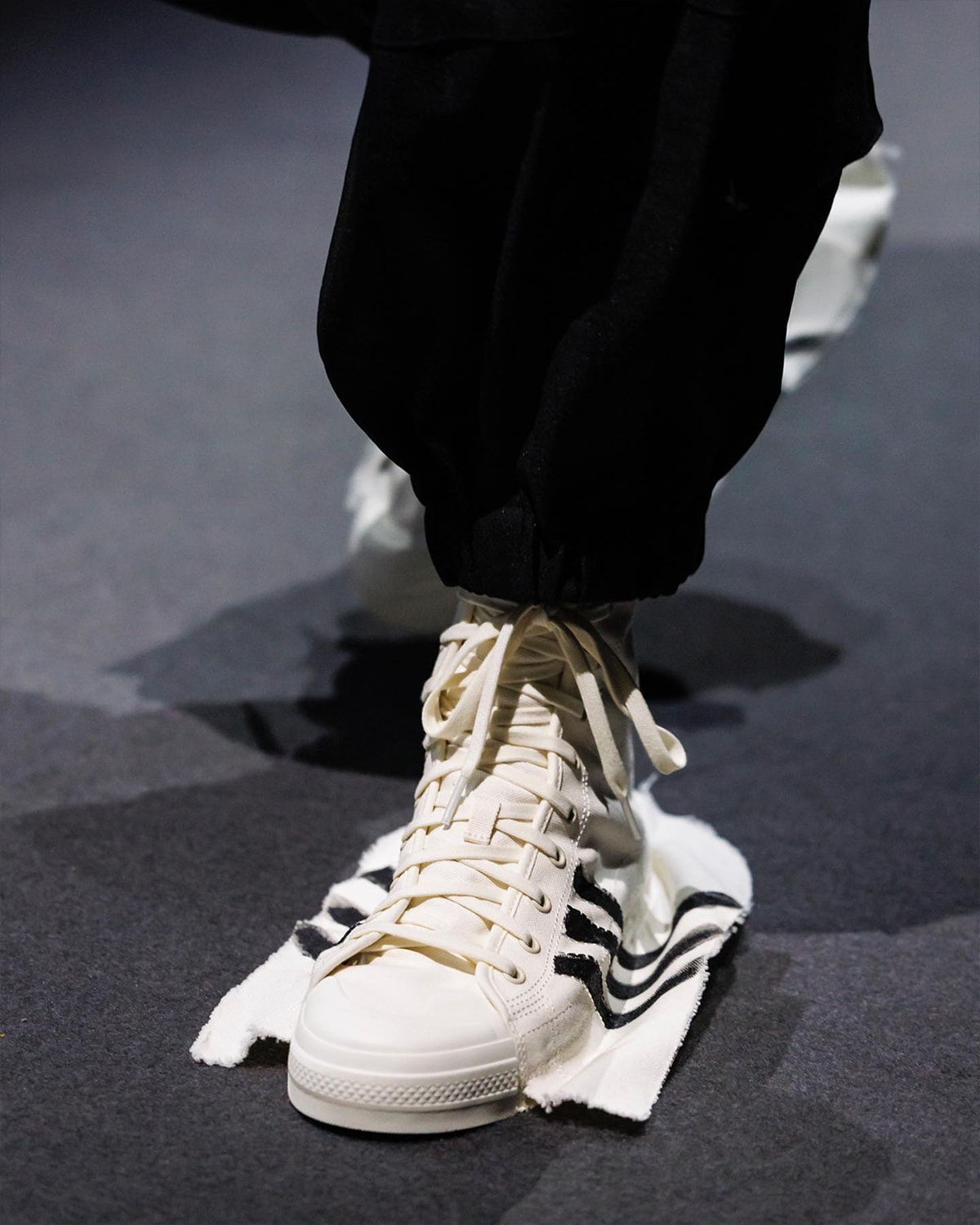 Biggest Footwear Moments From Paris Fashion Week SS25 comme des garcons homme plus nike air force 1 low black air force 1 low junya watanabe oakley factory team nigo air force 3 low feng chen wang ugg tasman sacai nike zegamadome a$ap rocky awge puma story mfg. asics roa suicoke cecilie bahnsen asics gel-quantum 360 viii y3 yohji yamamoto adidas rombaut puma levitation sock