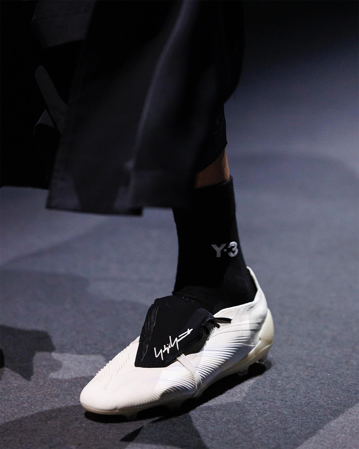 Biggest Footwear Moments From Paris Fashion Week SS25 comme des garcons homme plus nike air force 1 low black air force 1 low junya watanabe oakley factory team nigo air force 3 low feng chen wang ugg tasman sacai nike zegamadome a$ap rocky awge puma story mfg. asics roa suicoke cecilie bahnsen asics gel-quantum 360 viii y3 yohji yamamoto adidas rombaut puma levitation sock