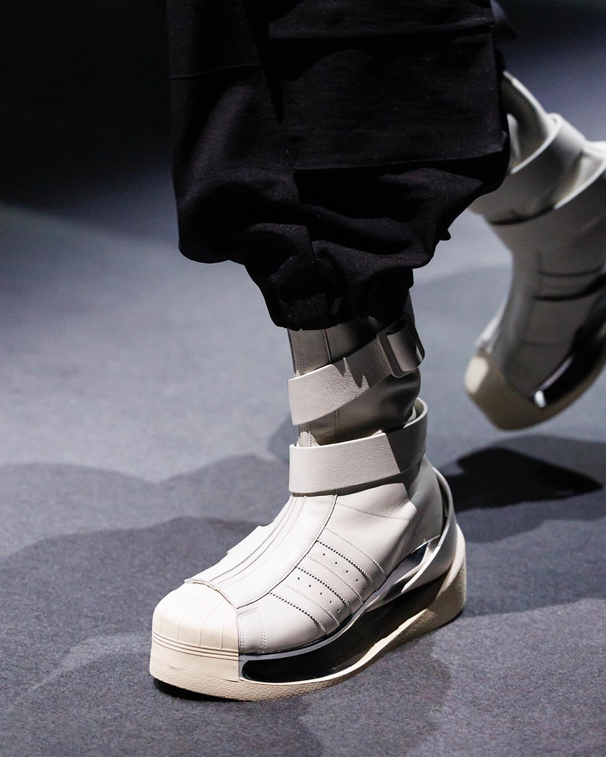 Biggest Footwear Moments From Paris Fashion Week SS25 comme des garcons homme plus nike air force 1 low black air force 1 low junya watanabe oakley factory team nigo air force 3 low feng chen wang ugg tasman sacai nike zegamadome a$ap rocky awge puma story mfg. asics roa suicoke cecilie bahnsen asics gel-quantum 360 viii y3 yohji yamamoto adidas rombaut puma levitation sock