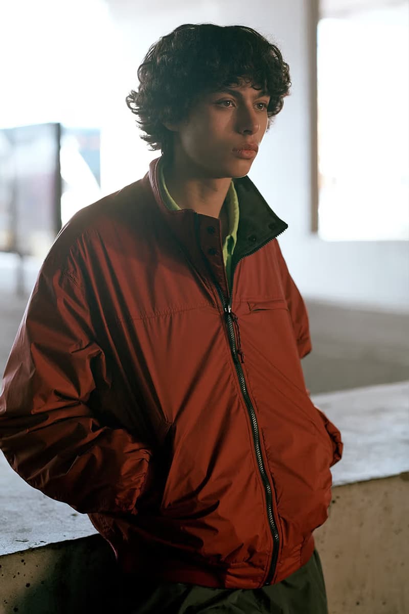 thisisneverthat FW24 Leans Into Cozy Airport Style lookbook fall/winter 2024 puffer jackets, vests with linings, and knits