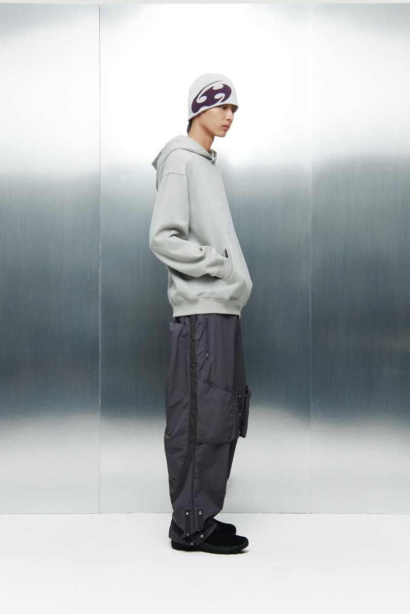 SAN SAN GEAR Serves Up Striking "pivot/node" FW24 Collection release info fashion apparel label capsule lookbook fall winter jacket puffer shell nylon outerwear hoodie t shirt brand seoul