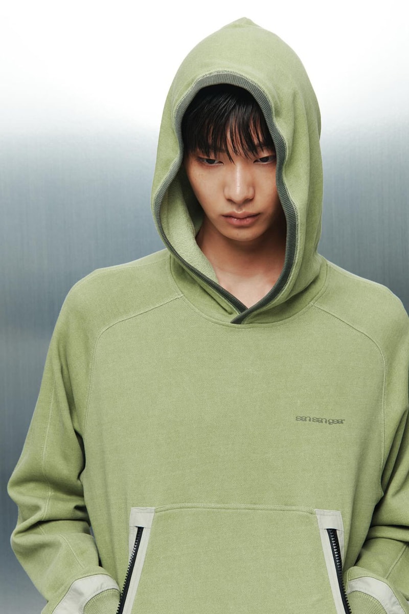 SAN SAN GEAR Serves Up Striking "pivot/node" FW24 Collection release info fashion apparel label capsule lookbook fall winter jacket puffer shell nylon outerwear hoodie t shirt brand seoul