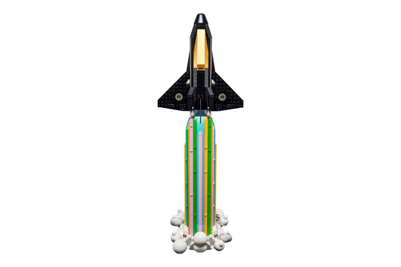 pharrell williams lego set spaceship black gold over the moon 966 pieces piece by piece animated movie preview collaboration