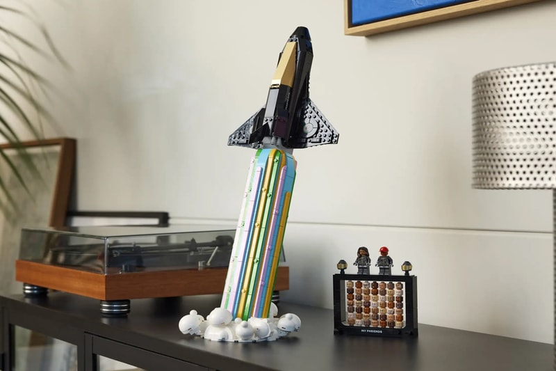 pharrell williams lego set spaceship black gold over the moon 966 pieces piece by piece animated movie preview collaboration