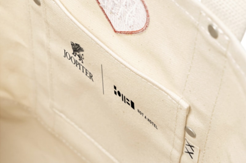 KAWS and HUMAN MADE Drop Limited Edition Tote Bag not a hotel joopiter auction nigo pharrell williams