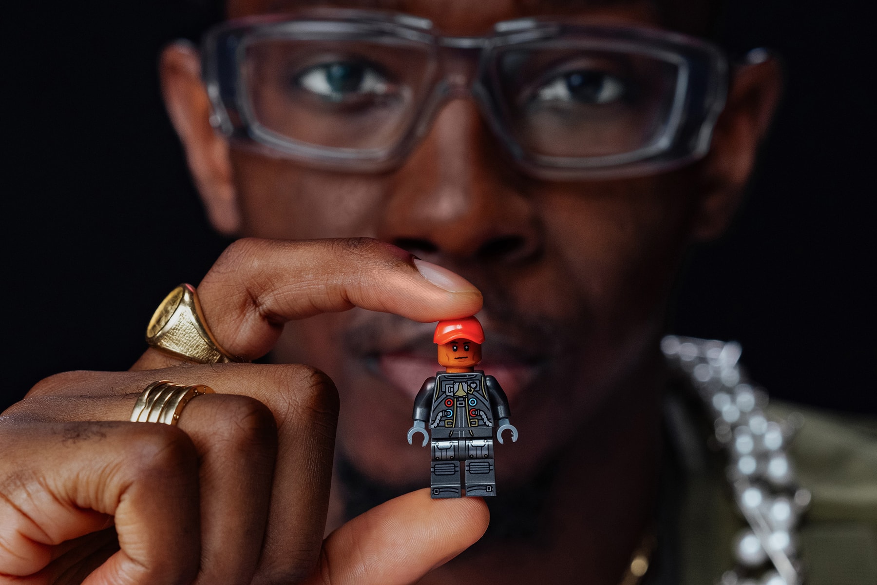 lego group pharrell williams jean jacques ndjoli paris france congo over the moon exclusive collaboration set creativity fashion vibrant color campaign video interview feature