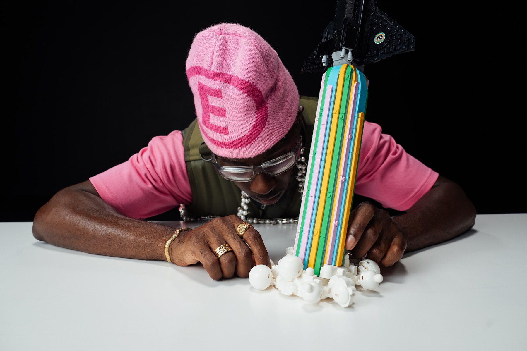 lego group pharrell williams jean jacques ndjoli paris france congo over the moon exclusive collaboration set creativity fashion vibrant color campaign video interview feature