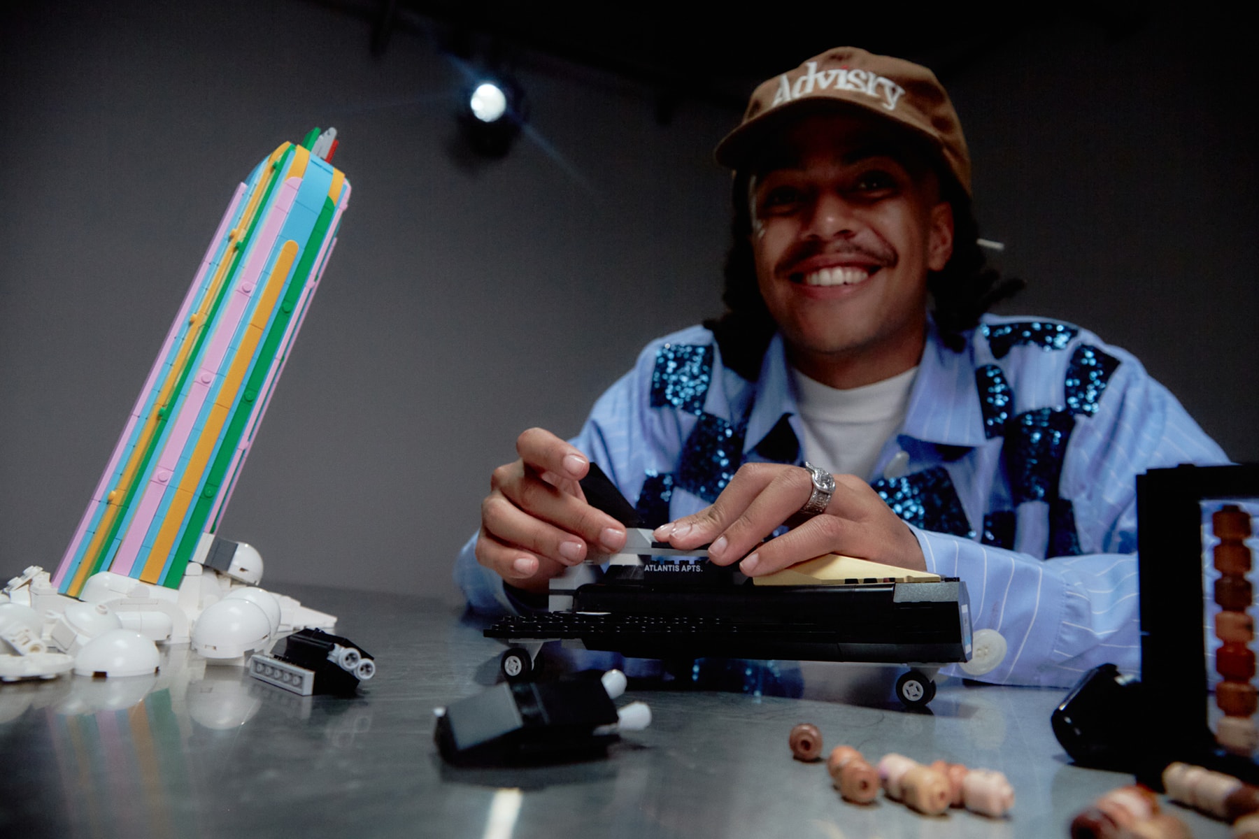 lego group pharrell williams keith herron new york los angeles streetwear fashion luxury over the moon exclusive collaboration set creativity fashion vibrant color campaign video interview feature