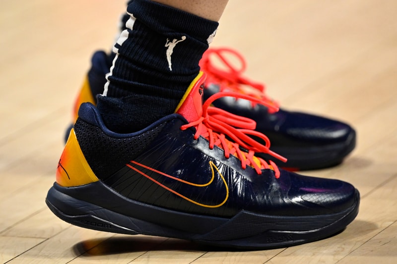 Caitlin Clark Debuts Indiana Fever-Themed Nike Kobe 5 Protro PE wnba rookie of the year player exclusive navy upper pink laces gradient treatment gold hue basketball shoes