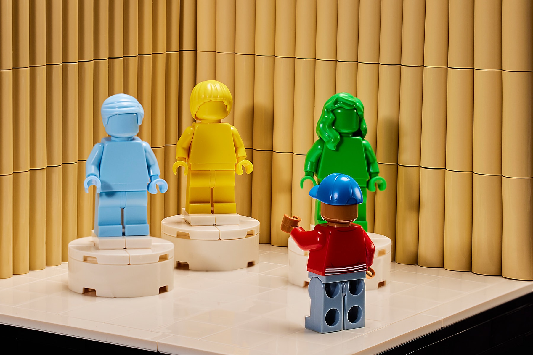 lego group pharrell williams jean jacques ndjoli paris france congo over the moon keith herron advisry new york exclusive collaboration set creativity fashion vibrant color campaign video interview feature brick world realm discipline