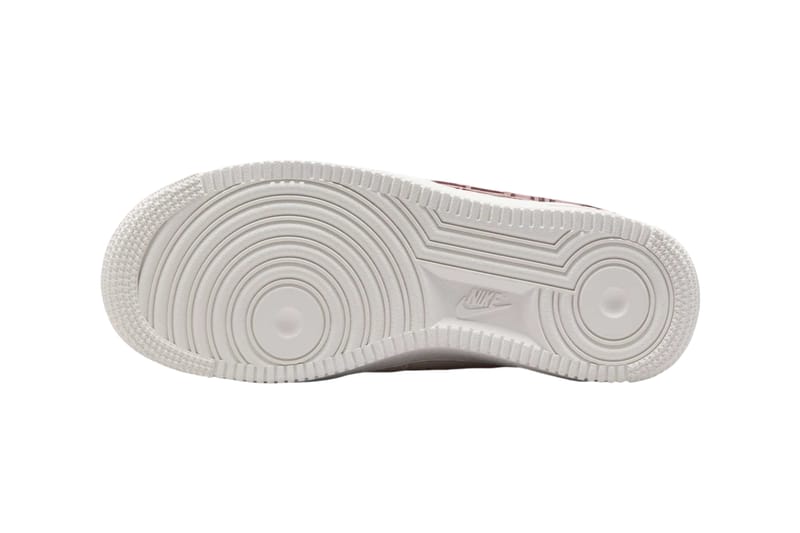 black nikes rose gold swoosh