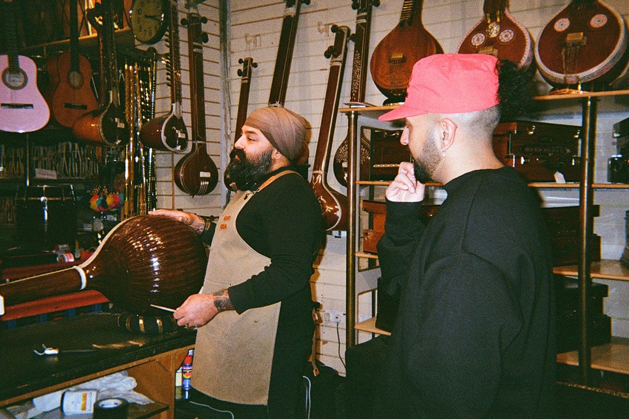 artist southall london tshirts shop window colorful clothes musician instrument