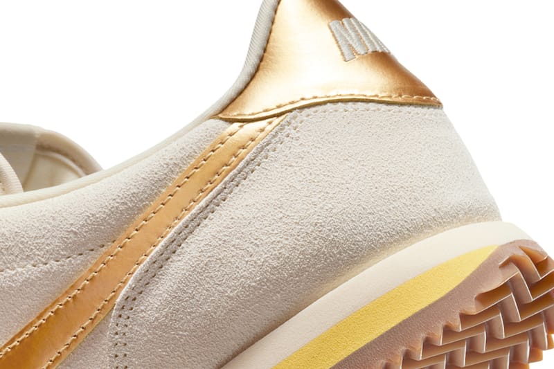white and gold nike cortez