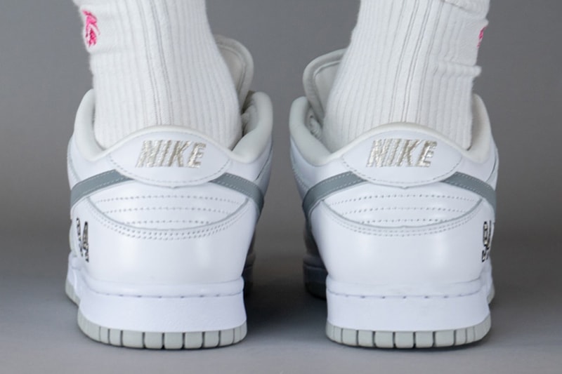 supreme nike sb dunk low white grey hq8487 100 official release date info photos price store list buying guide