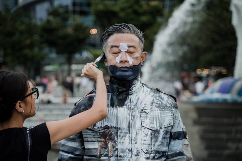 Liu Bolin Hiding in Singapore Performance Singapore Art Week Artwork