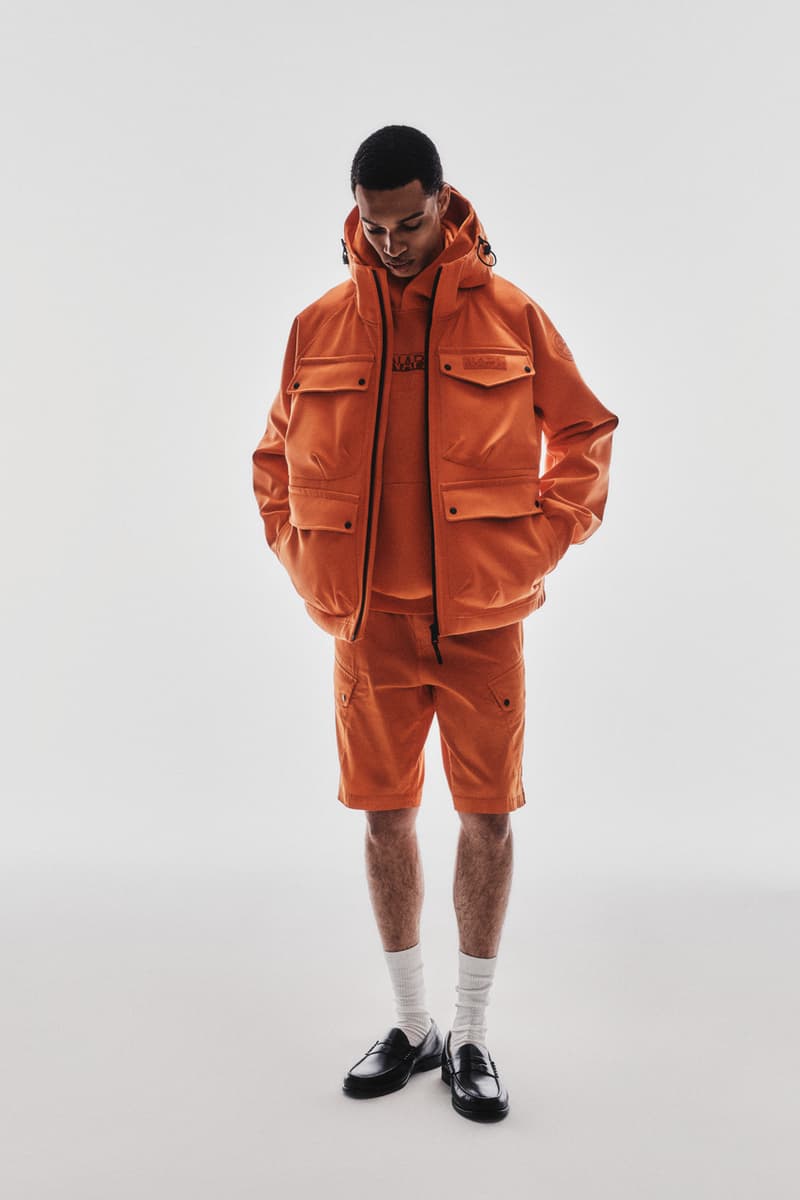 napapijri spring summer 2025 exploration heritage new perspectives technical outerwear milan fashion week lennon gallagher blue orange fleeces polos tshirts anoraks laminated cooling systems