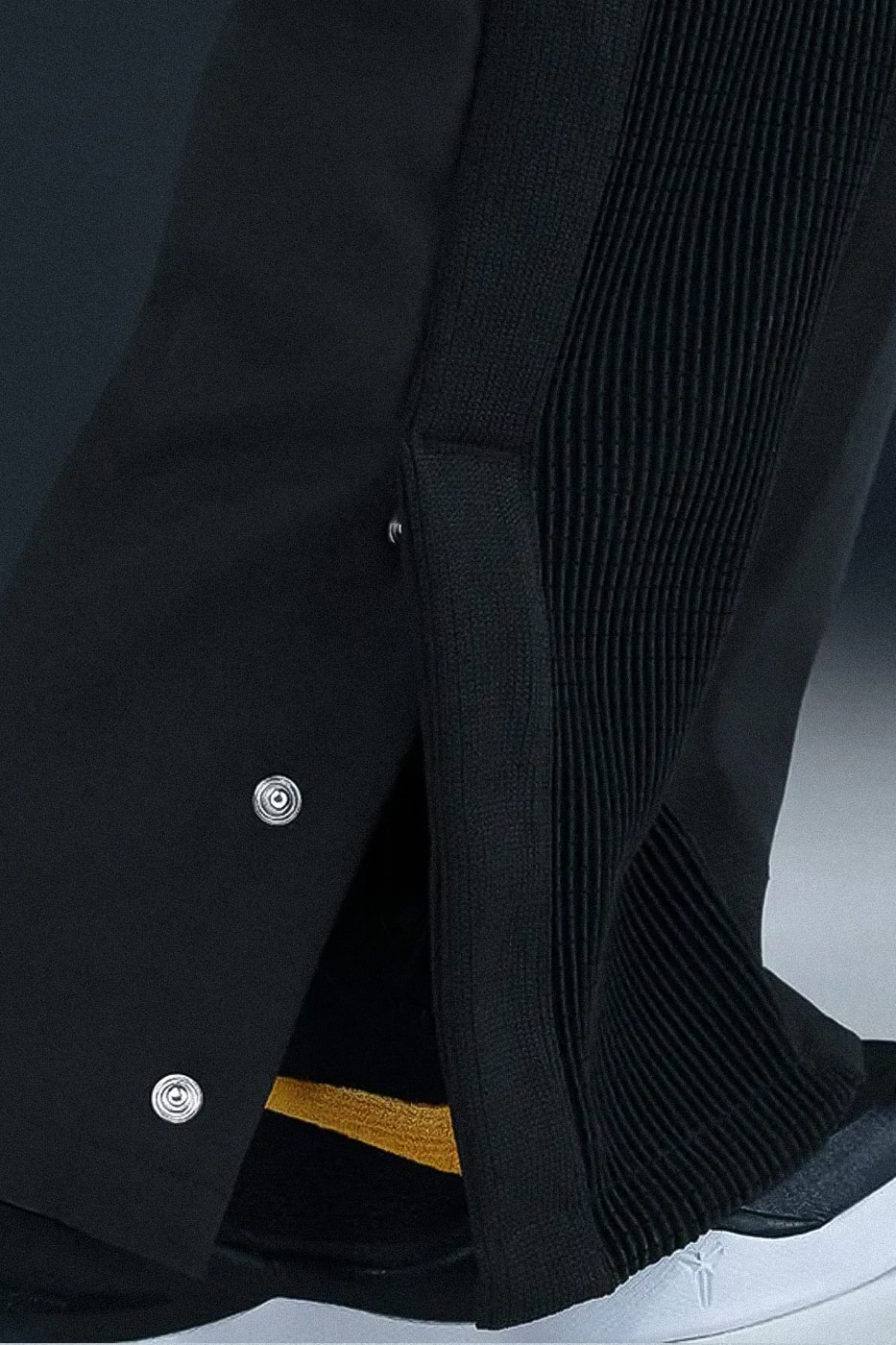 Nike Expands Kobe Bryant's Mamba Collection With Football-Focused Apparel jerseys ripstop pants track pants tshirts black mamba