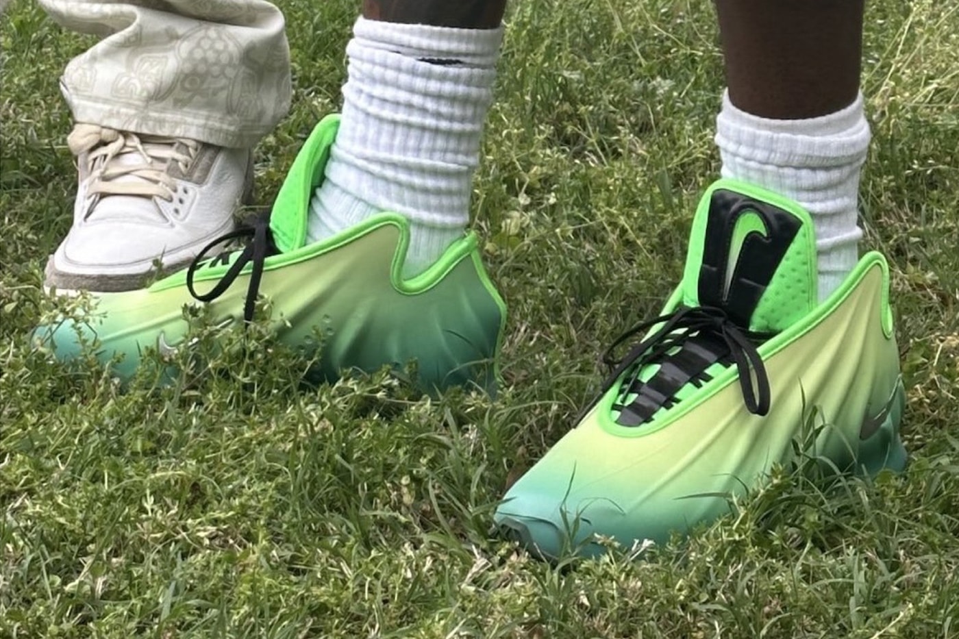 Wale Debuts New Nike GT Future "Kryptonate"-Inspired Colorway grinch rapper fitsforthestreets dmv hypeflight air flightposite one