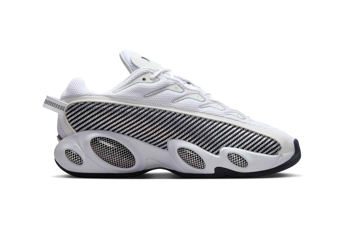 Drake's Nike NOCTA Glide Surfaces in a Minimalist "White/Black" release info zoom flight 95 inspired sneaker white and black university gold DM0879-101