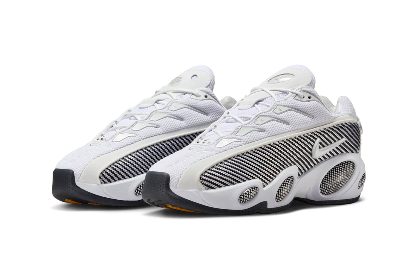 Drake's Nike NOCTA Glide Surfaces in a Minimalist "White/Black" release info zoom flight 95 inspired sneaker white and black university gold DM0879-101
