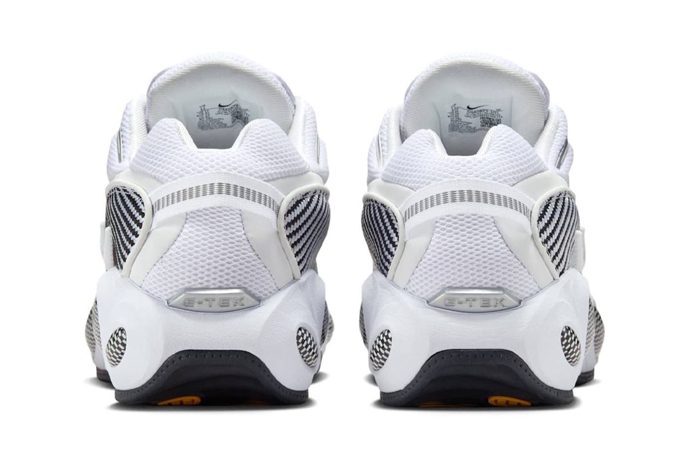Drake's Nike NOCTA Glide Surfaces in a Minimalist "White/Black" release info zoom flight 95 inspired sneaker white and black university gold DM0879-101
