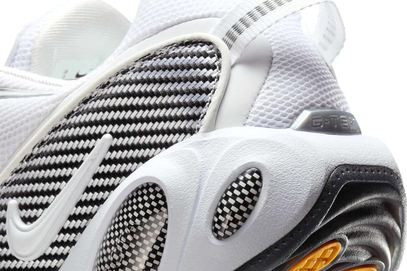 Drake's Nike NOCTA Glide Surfaces in a Minimalist "White/Black" release info zoom flight 95 inspired sneaker white and black university gold DM0879-101