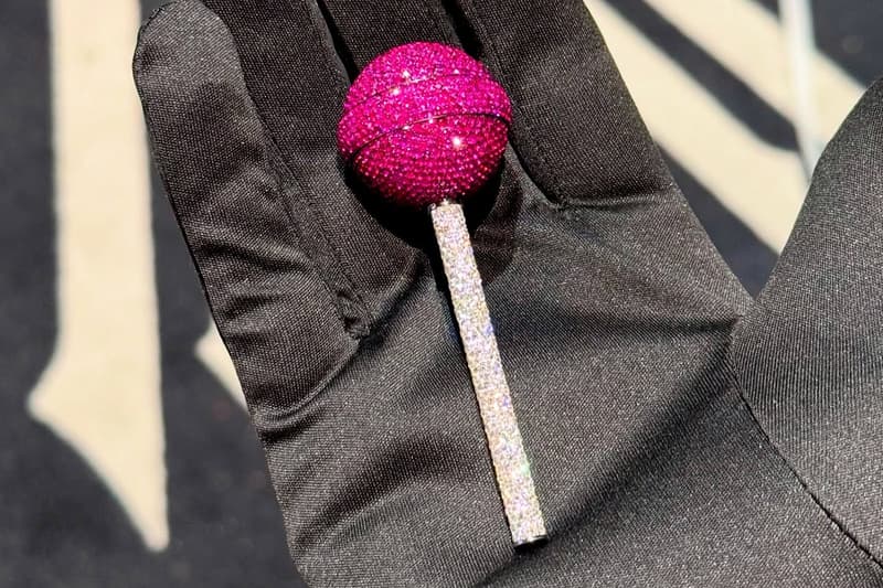 Playboi Carti Unveils Dazzling Diamond Lollipop by Alex Moss ny jeweler 2025 bet awards rapper performance sucker candy