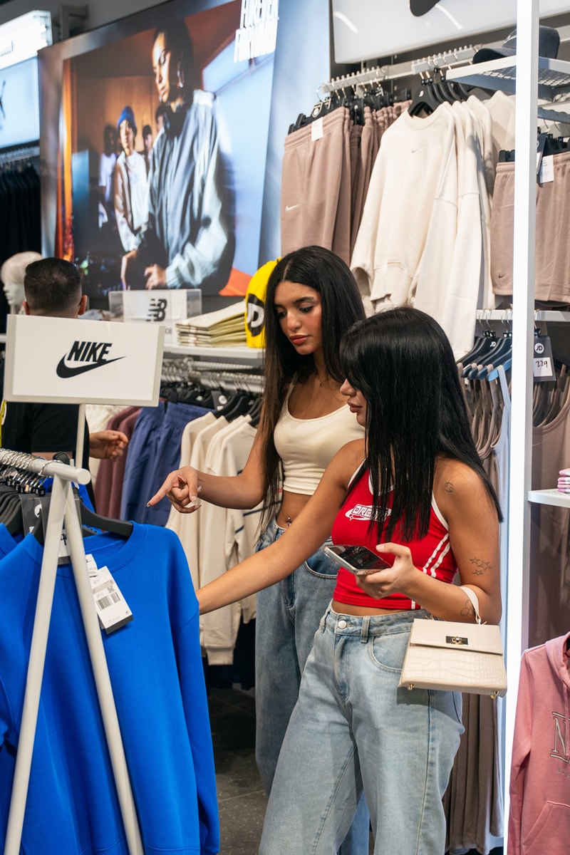 jd sports city centre mirdif store opening puma nike adidas sportswear shopping dubai party event dj ruuz stanley customization 