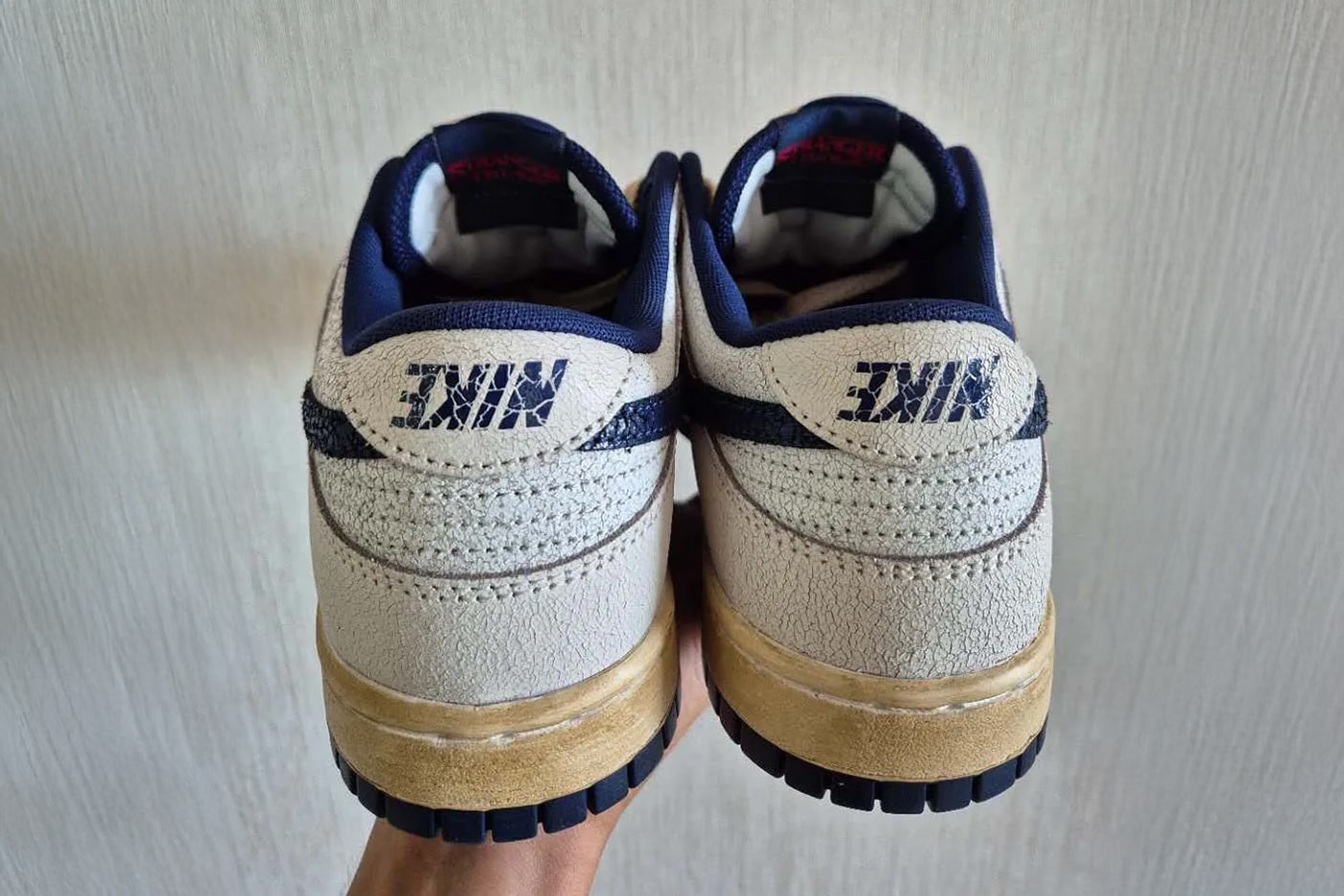 Stranger Things Nike Dunk Low Pack Phantom Midnight Navy Black Speed Red IH6766-001 IH6766-002 Release Info