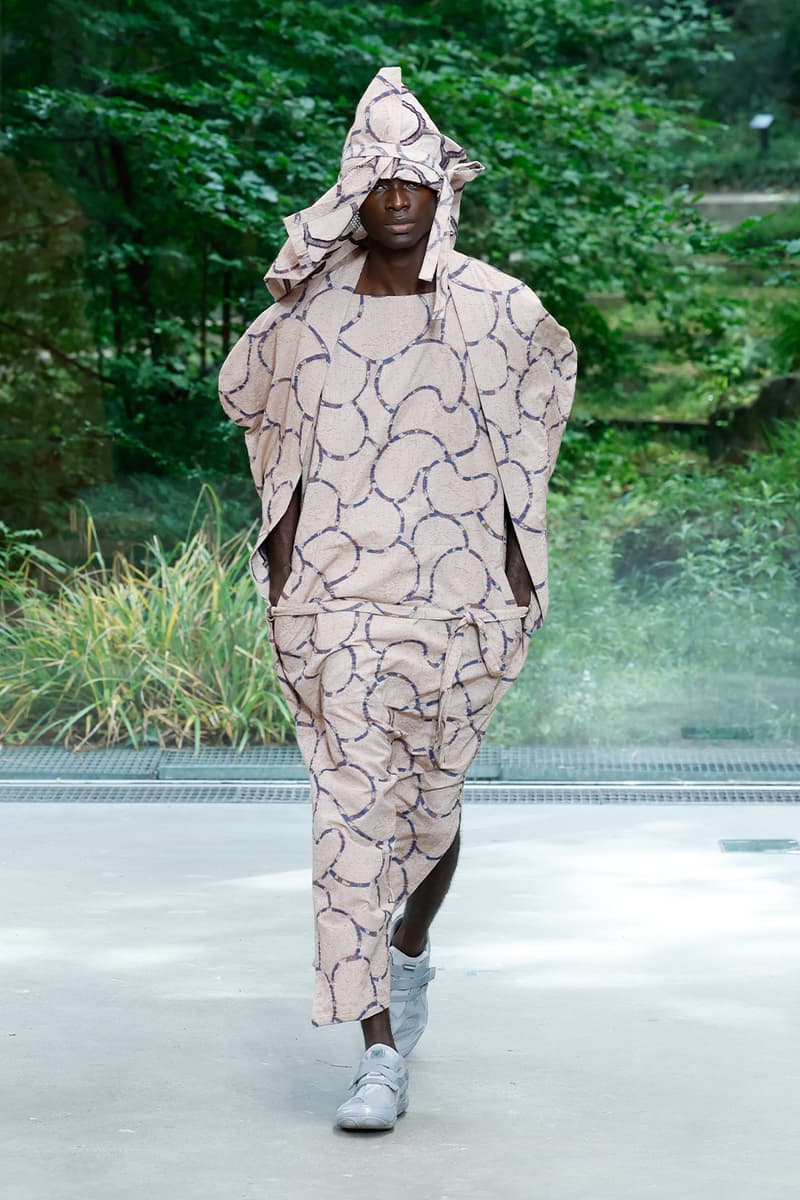 Issey Miyake's IM MEN SS26 Paris Fashion Week  Issey Miyake's IM MEN SS26 Unveils a Poetic Dialogue Between Fabric and Form, Inspired by Shoji Kamoda asics