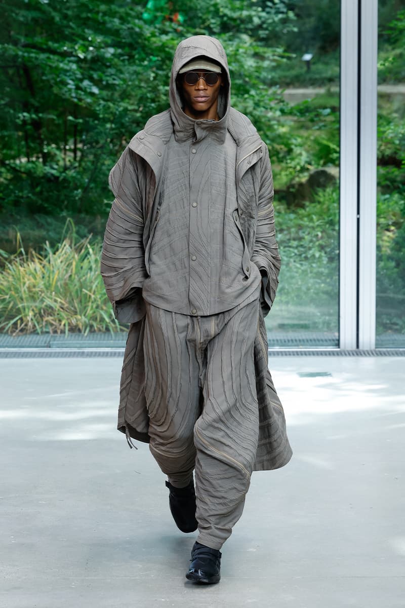 Issey Miyake's IM MEN SS26 Paris Fashion Week  Issey Miyake's IM MEN SS26 Unveils a Poetic Dialogue Between Fabric and Form, Inspired by Shoji Kamoda asics