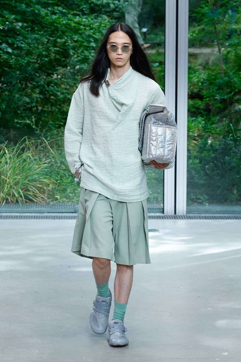 Issey Miyake's IM MEN SS26 Paris Fashion Week  Issey Miyake's IM MEN SS26 Unveils a Poetic Dialogue Between Fabric and Form, Inspired by Shoji Kamoda asics