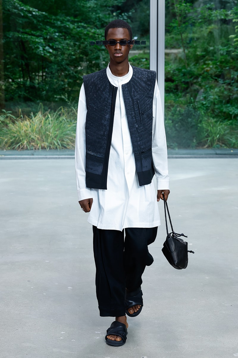 Issey Miyake's IM MEN SS26 Paris Fashion Week  Issey Miyake's IM MEN SS26 Unveils a Poetic Dialogue Between Fabric and Form, Inspired by Shoji Kamoda asics