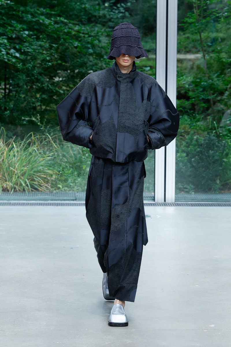 Issey Miyake's IM MEN SS26 Paris Fashion Week  Issey Miyake's IM MEN SS26 Unveils a Poetic Dialogue Between Fabric and Form, Inspired by Shoji Kamoda asics