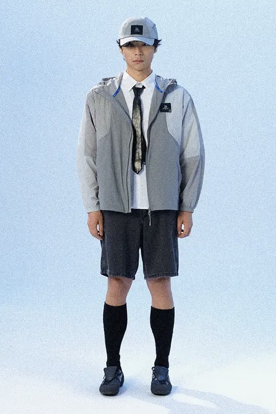 GCore Industries Drops Official PlayStation Apparel merch collaboration release info t-shrits windbreaker blue logo sony