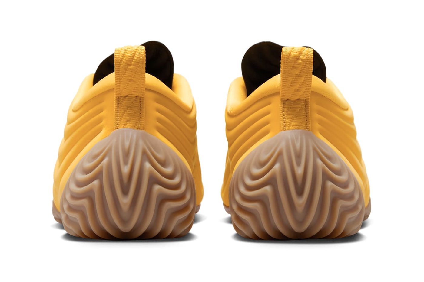 Official Look at the Nike Astra Ultra “University Gold” University Gold/Gum Light Brown-Black FZ5778-701 swoosh gold yellow gum