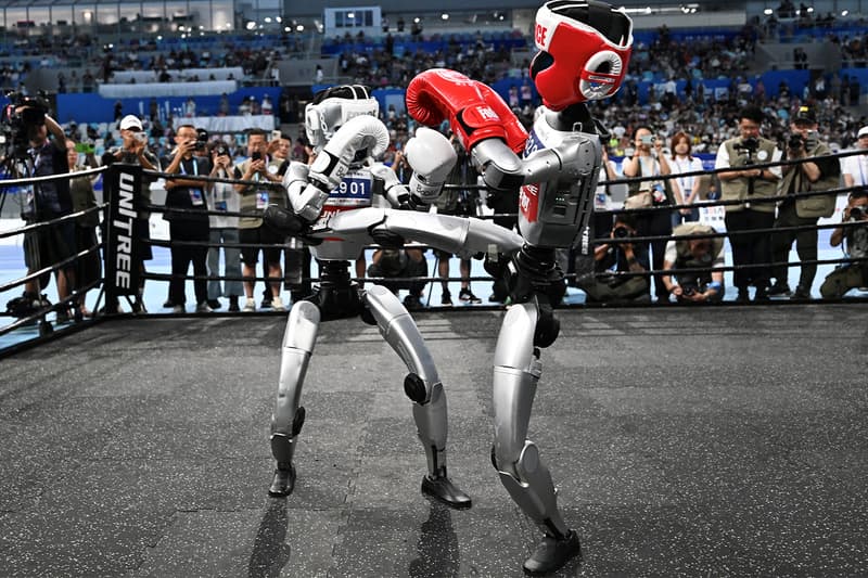 China Hosts First Humanoid Games soccer boxing track and field world's first robots taking over humans training boxers