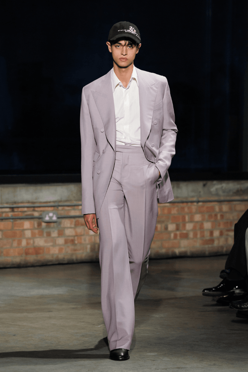 Aaron Esh Routs Back to Classical Menswear for SS26 Oval Space in Hackney London Fashion Week Katy England Savile Row tailor Charlie Allen